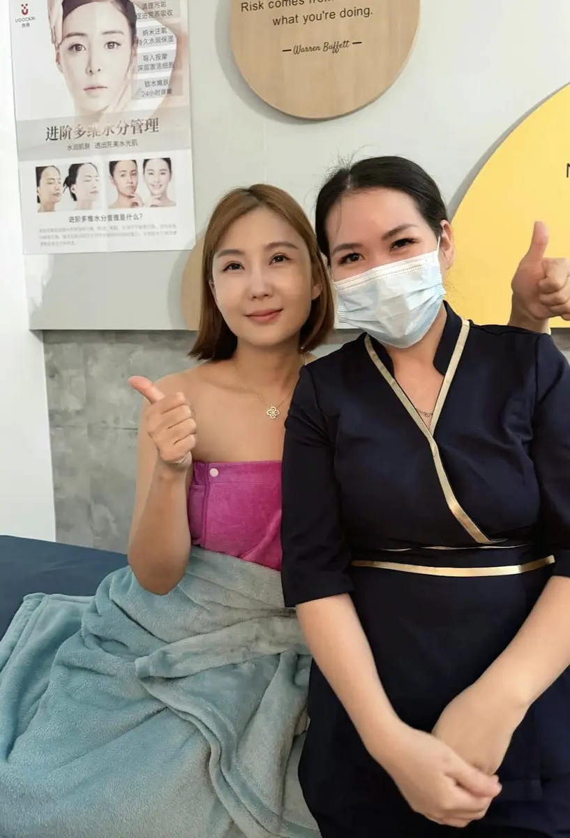 Happy client with therapist